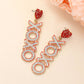 Stone Paved XOXO Message Dangle Heart Pointed Earrings
: Red